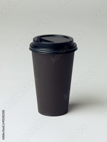 Coffee cup set - mockup template for cafes, design of the restaurant's corporate style. Black cardboard coffee cup mockup. Template disposable plastic and paperware for hot drinks