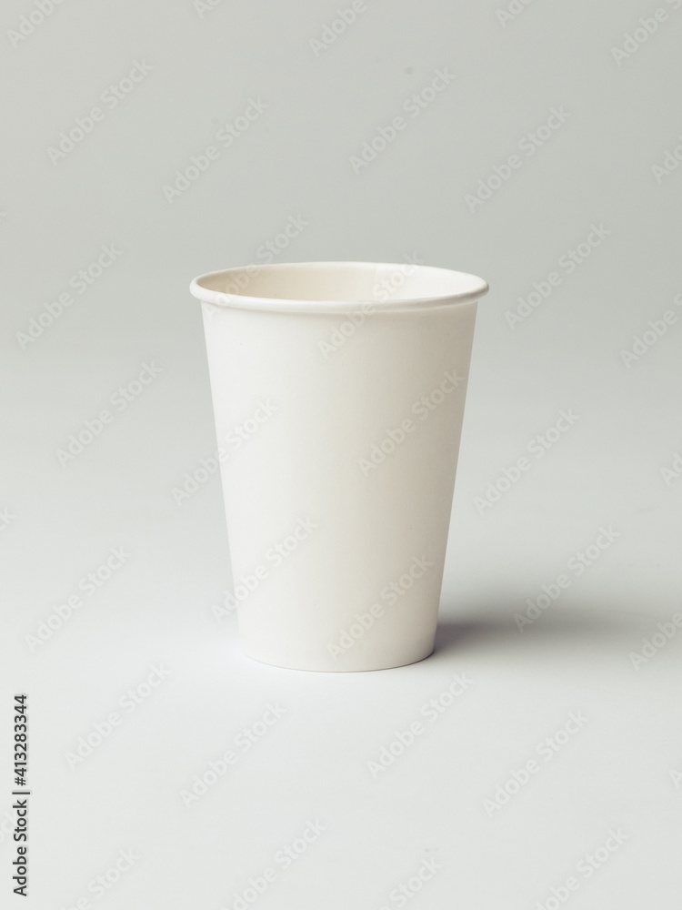Coffee cup set - mockup template for cafes, design of the restaurant's corporate style. White cardboard coffee cup mockup. Template disposable plastic and paperware for hot drinks Coffee cup set - mockup template for cafes, design of the restaurant's corporate style. White cardboard coffee cup mockup. Template disposable plastic and paperware for hot drinks