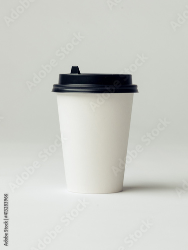 Coffee cup set - mockup template for cafes, design of the restaurant's corporate style. White cardboard coffee cup mockup. Template disposable plastic and paperware for hot drinks