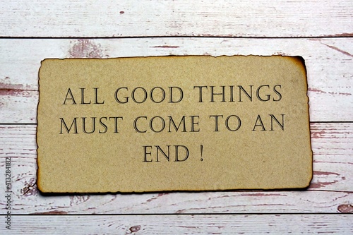 Motivational and inspirational quote on paper with burnt edge - All good things must come to an end