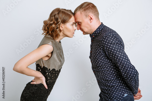Εκτύπωση καμβά A young man and his girlfriend rest their heads against each other