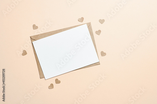 Greeting card mockup with small hearts on paper background