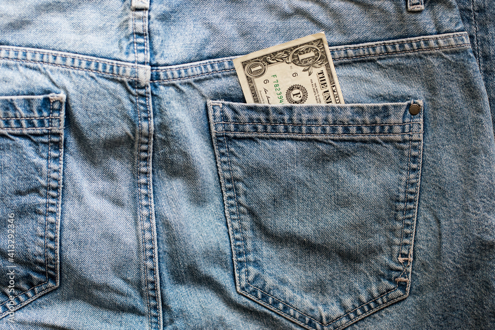us dollars cash in jeans pocket
us dollars cash in jeans pocket