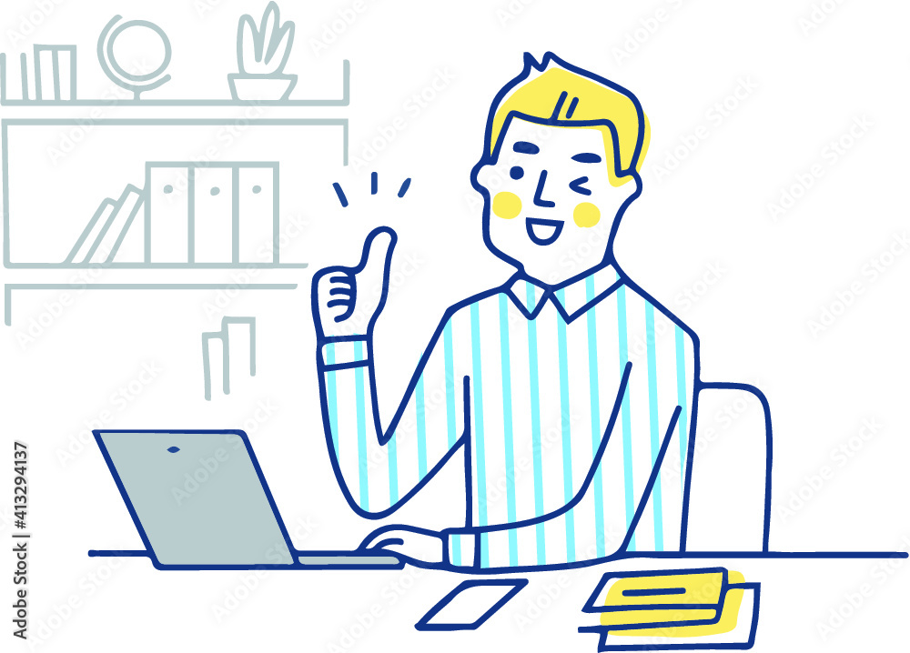サムズアップをしながらパソコン作業をする男性
