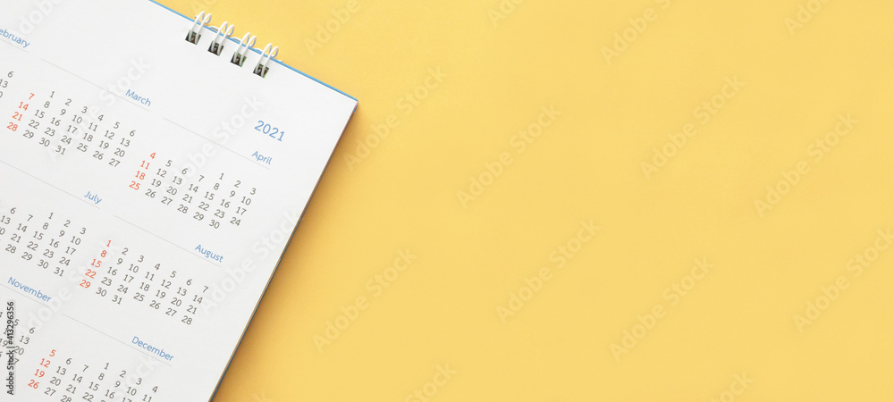 2021 calendar page on yellow color background business planning appointment meeting concept - obrazy, fototapety, plakaty 