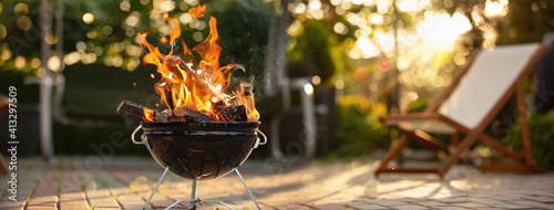 Foto Barbecue Grill With Fire On Open Air