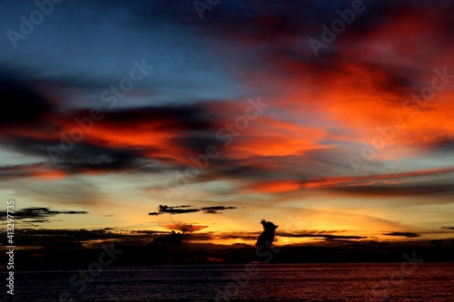 a sunset in the gandoriah beach © shinta