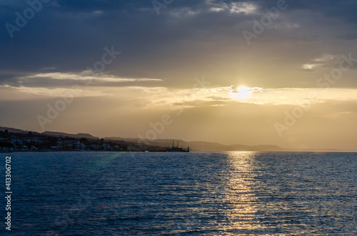 Sunset over the coastal, tourist, place Pefkohori, Greece  © caocao191