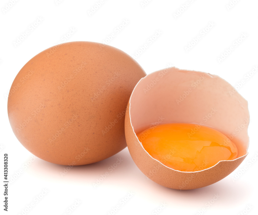 Broken egg in eggshell half and raw egg isolated on white background cutout Broken egg in eggshell half and raw egg isolated on white background cutout