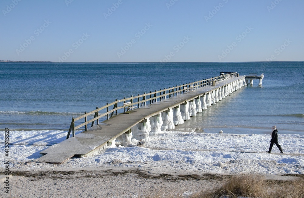 pier on the beach at wintertime
