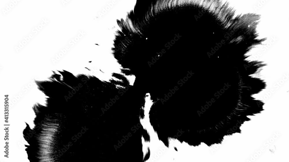 Ink bloom. black ink blots on isolated white background. ink drops transition