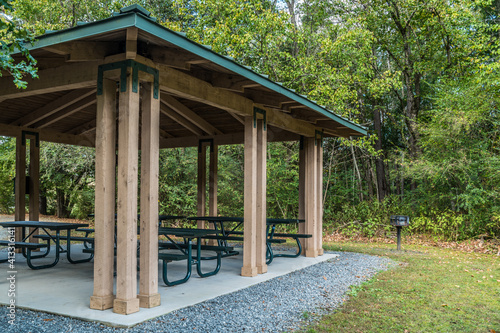 Fotografie Covered picnic area with grill in the park