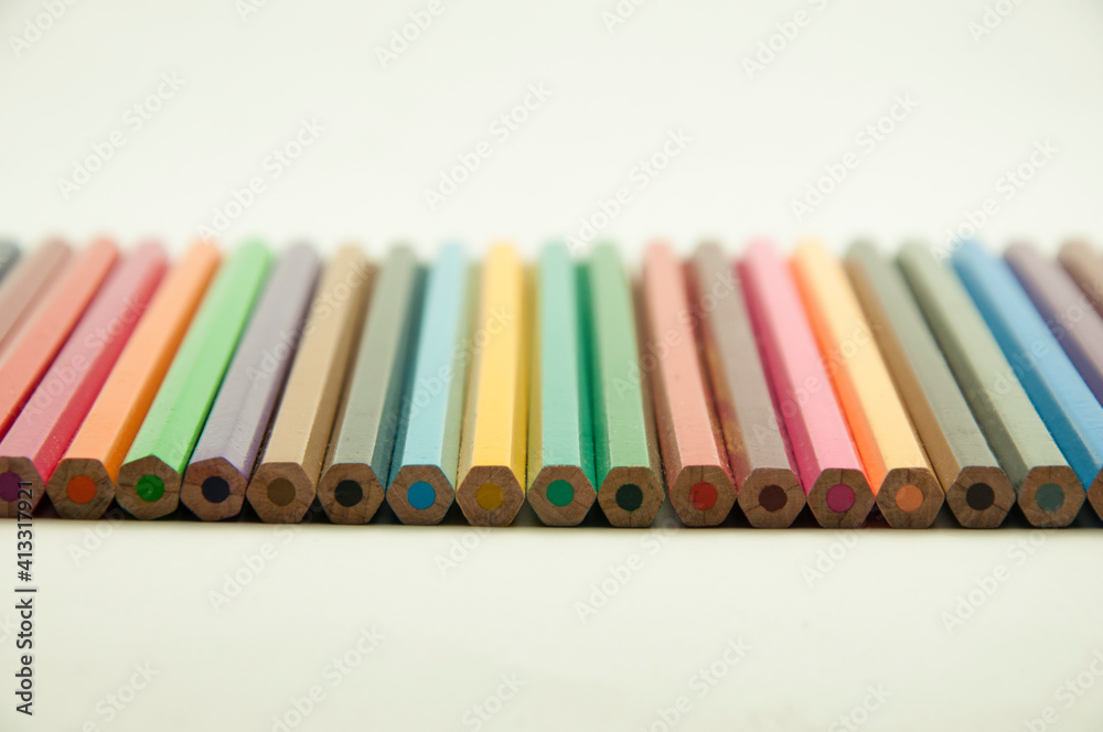 colored pencils on a white background. education concept. illustration of training. colored pencils on a white background. education concept. illustration of training.