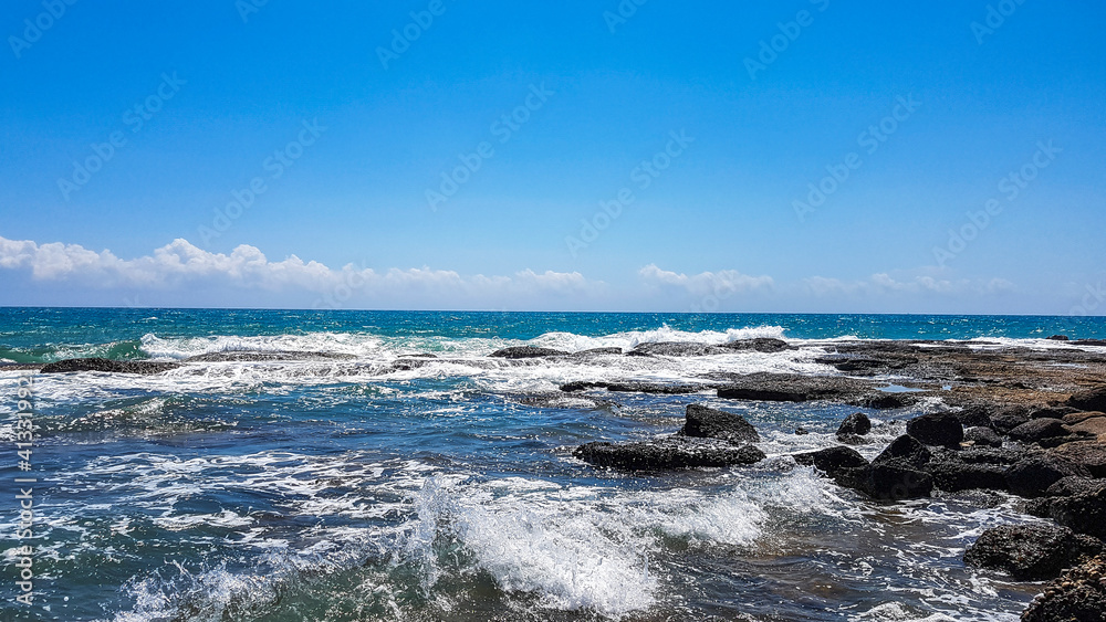 Turkey, one of the most beautiful sights and spectacular nature of antalya summer day sparkling blue sea sparkling waves and rocks. Turkey, one of the most beautiful sights and spectacular nature of antalya summer day sparkling blue sea sparkling waves and rocks.