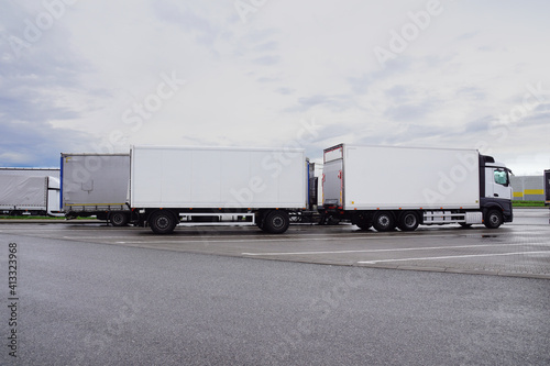Truck stop on a rainy day. Trucks during a stopover. © Wlodzimierz