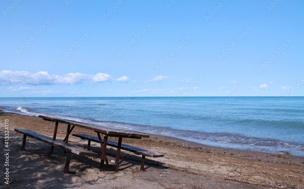Isolated Picnic table on the Beautiful Beach of Huron Lake near Goderich, Ontario, Canada