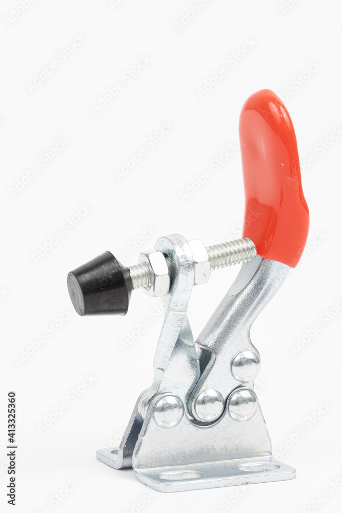 CNC table vice clamp above white background CNC table vice clamp above white background