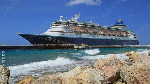 Cruise Ship in port on Caribbean island on sunny day