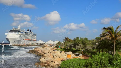 Cruise Ship in port on Caribbean island on sunny day