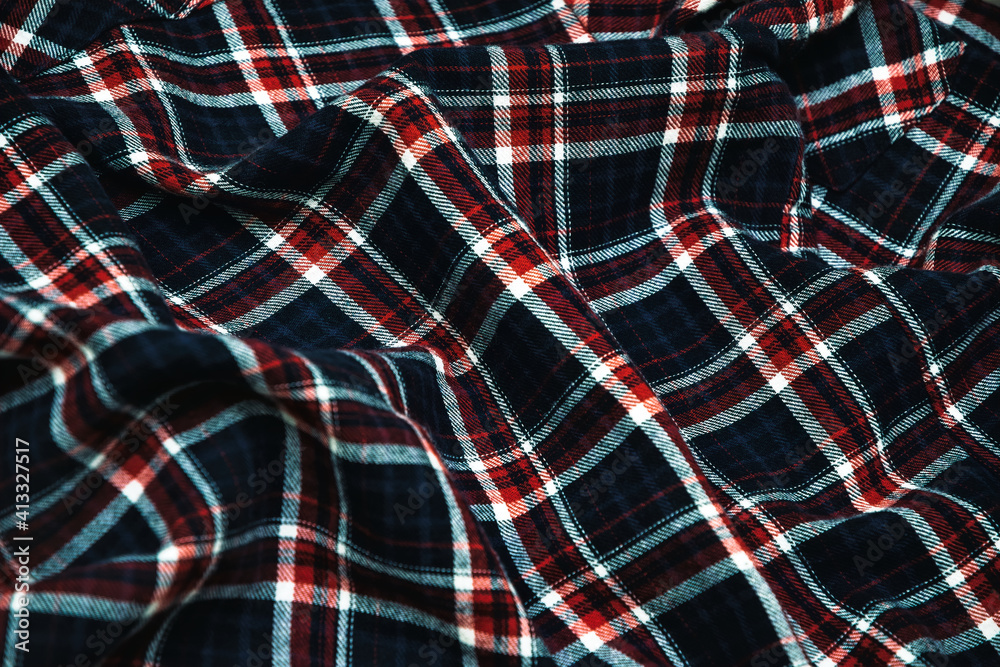 Woolen checkered fabric texture. Warm winter blanket Woolen checkered fabric texture. Warm winter blanket
