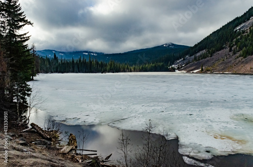 Frozen mountain lake, Washington state, US