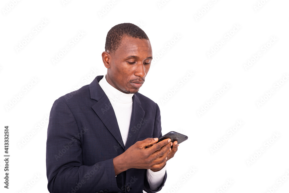 close-up of a handsome businessman looking at cellphone. close-up of a handsome businessman looking at cellphone.