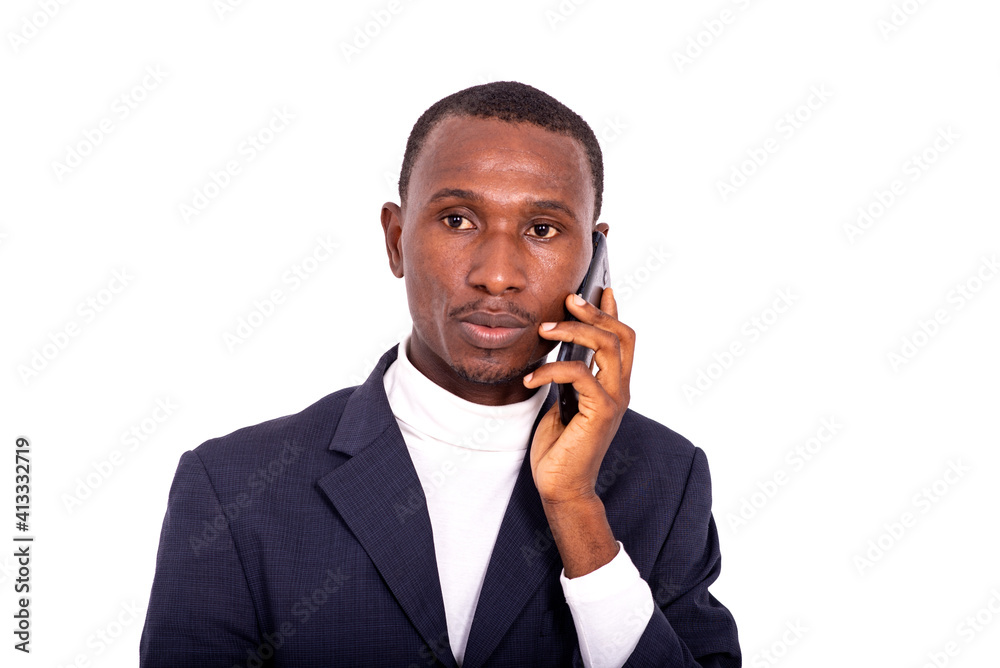 close-up of a handsome businessman talking on the cellphone. close-up of a handsome businessman talking on the cellphone.
