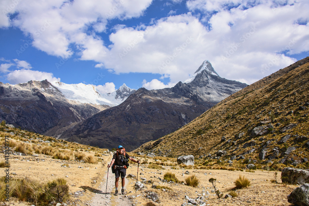 Obraz premium Trekking along the Artesonraju, the peak that inspired the Paramount Pictures logo, Santa Cruz trek, Cordillera Blanca, Ancash, Peru