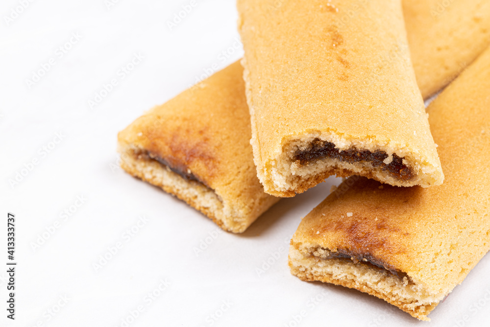 Cookies with fruit filling above white background Cookies with fruit filling above white background