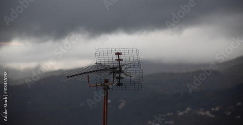 TV antenna in clouds