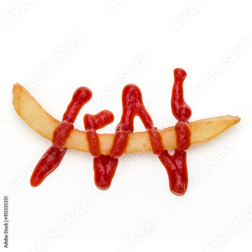 French Fried Potatoes with ketchup isolated on white background