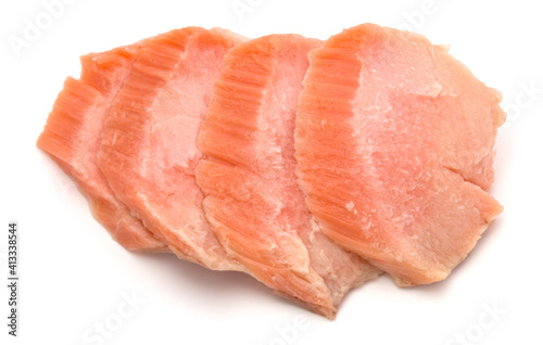 smoked salmon segments isolated on white background cutout. Prepared fish fillet fibres.