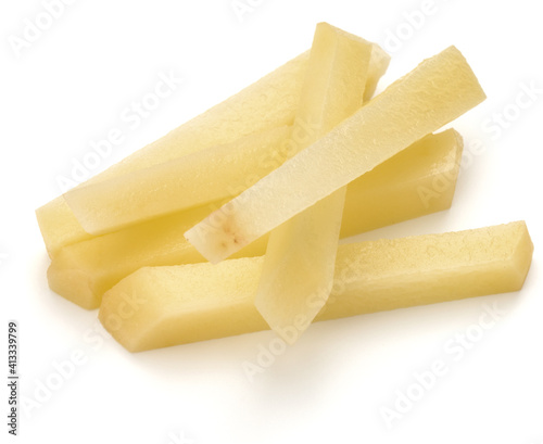 Raw Potato sliced strips prepared for French fries isolated on white background