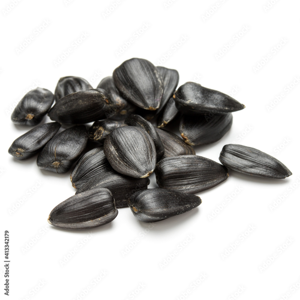 Sunflower seeds isolated on white background close up Sunflower seeds isolated on white background close up