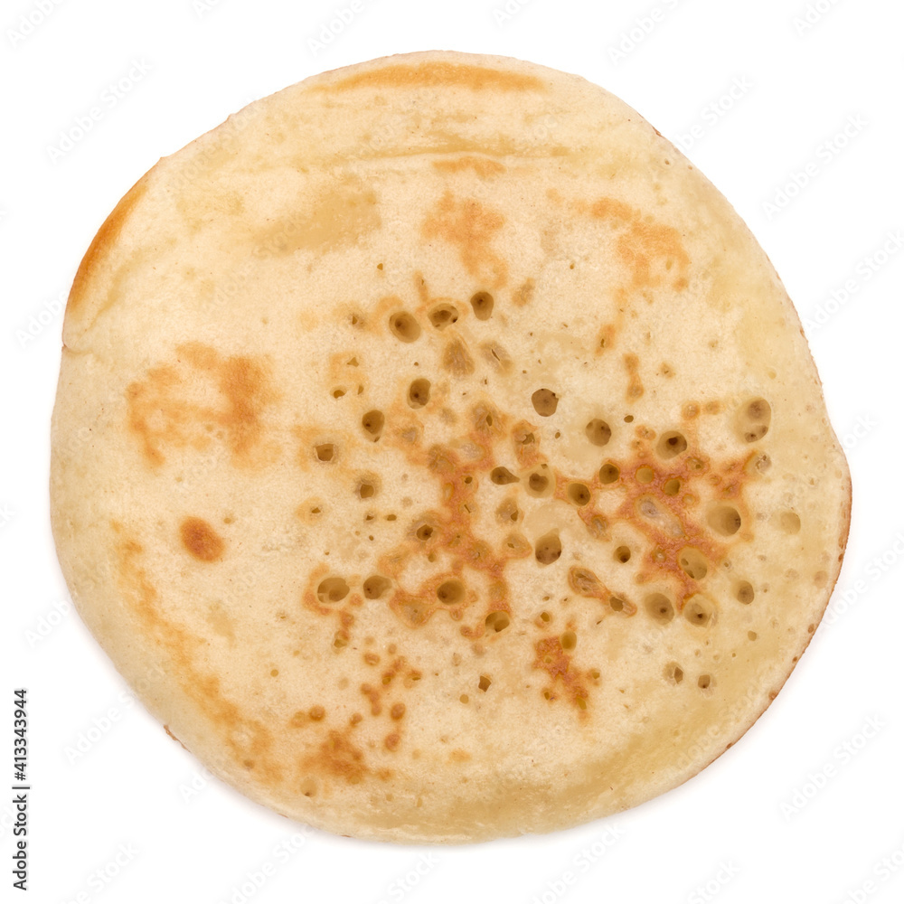 One pancake isolated on white background cutout. Top view. One pancake isolated on white background cutout. Top view.