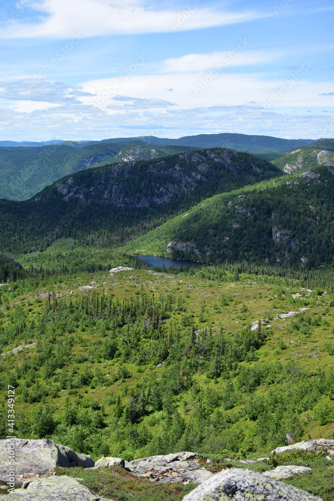 Naklejka premium Grands-Jardins Sepaq National Park, Quebec, Canada: View from the peak of Mont du Lac-des-Cygnes on a summer sunny day
