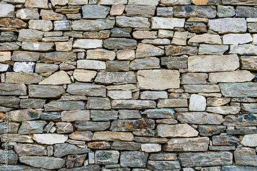 old rock stone wall texture background.