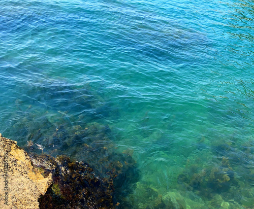 Turquoise sea crystal clear water, rippled waves of Mediterranean sea.