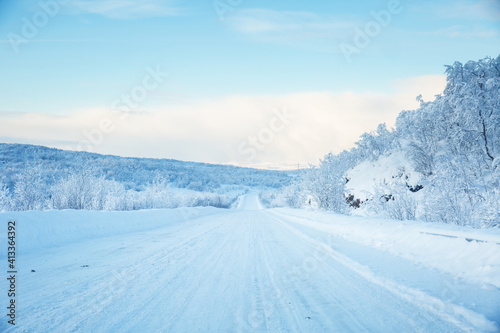 beautiful winter road on a sunny day 