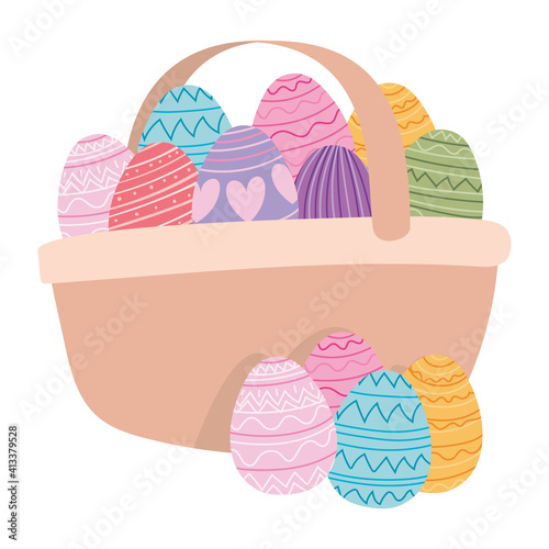 basket full of easter eggs on a white background