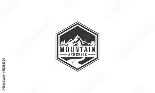 mountain and creek logo with mountain and creek illustration