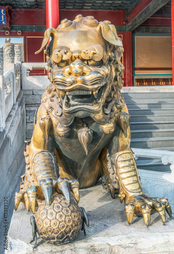 China, Beijing. Forbidden City's lion guardian.
