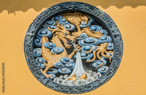 China, Shanghai. Jade Buddha Temple dragon bas-relief.