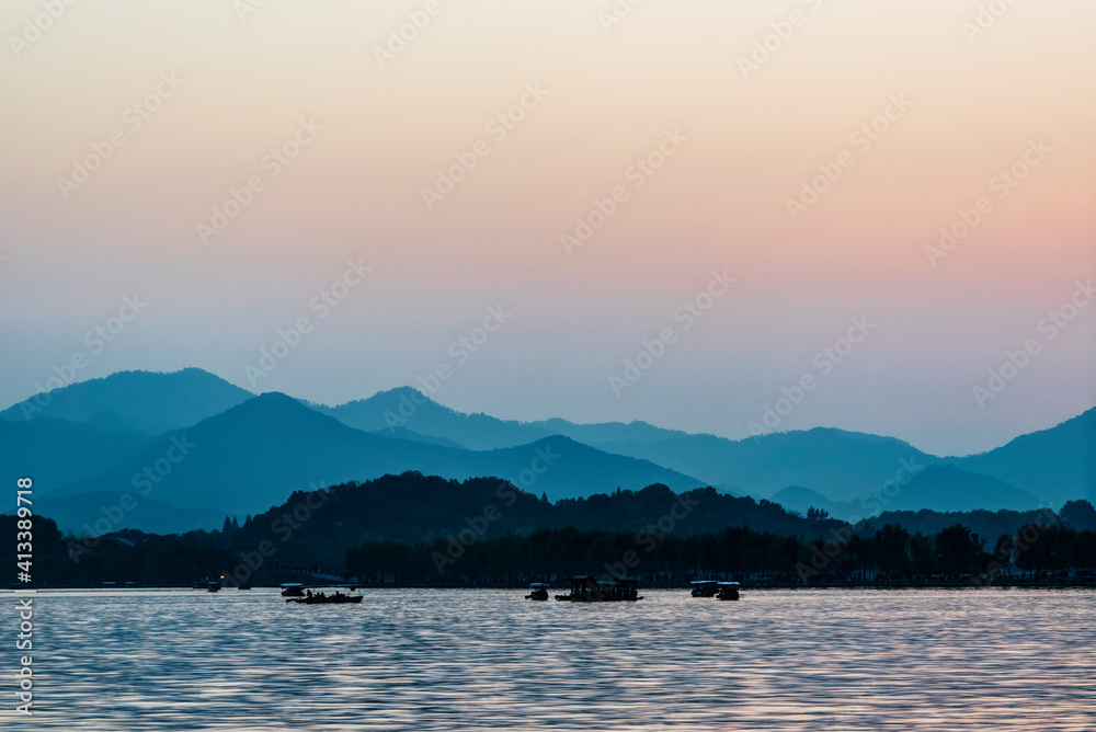 China, Zhejiang, Hangzhou. West Lake sunset.