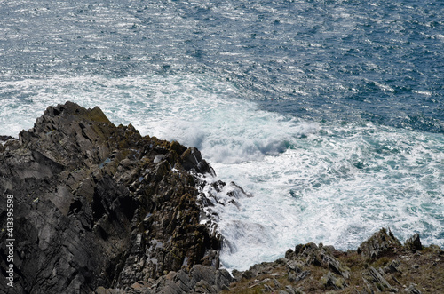 waves crashing on rocks