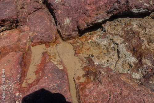 puddle of water on rocks 