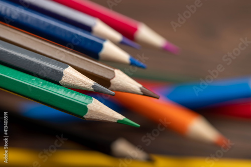 A few colored pencils. Close-up, selective focus.