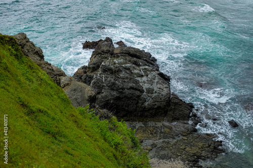 The beautiful blue waves of the beach in Gunungkidul photo