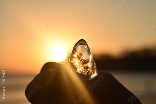 A transparent stone illuminated by the sunset