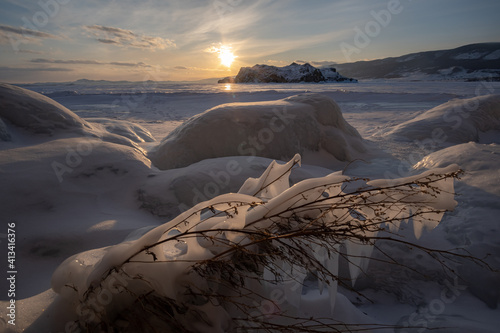 Icy grass on the shore of Lake Baikal photo